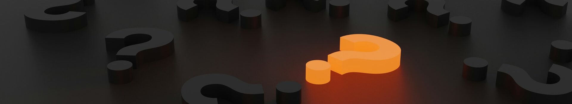 Dark three dimensional question marks with two glowing orange ones standing out